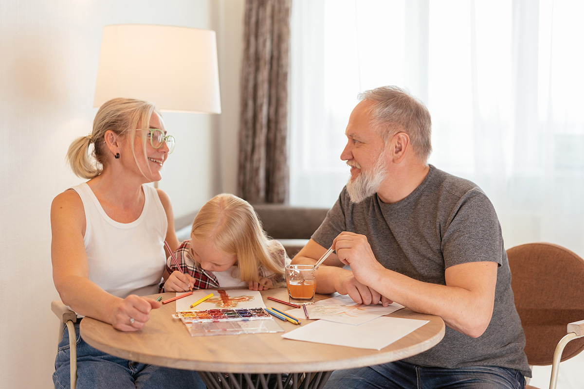 grandparents drawing with grand daughter adult mental health concept